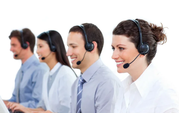 Multi-ethnic business talking on headset — Stock Photo, Image