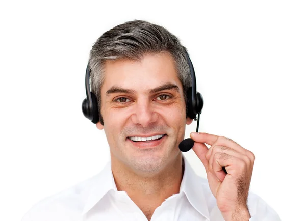 Volwassen zakenman met behulp van headset — Stockfoto