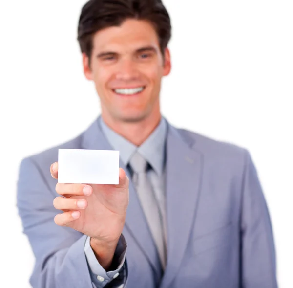 Empresario positivo sosteniendo una tarjeta blanca —  Fotos de Stock