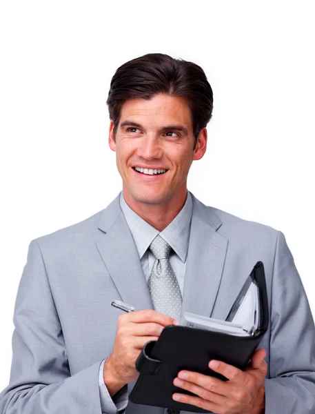 Attractive businessman holding an agenda — Stock Photo, Image