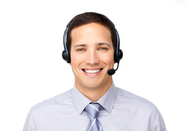 Homem de negócios sorrindo falando em fone de ouvido — Fotografia de Stock