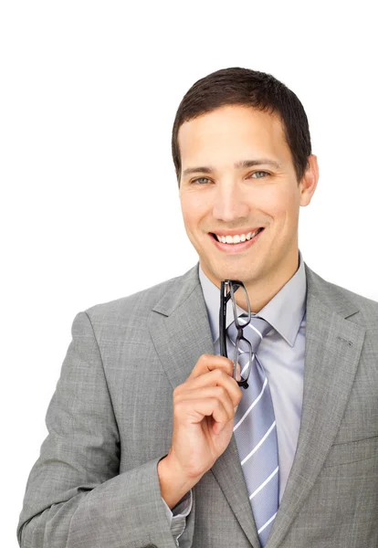 Confident young businessman holding glasses — Stock Photo, Image
