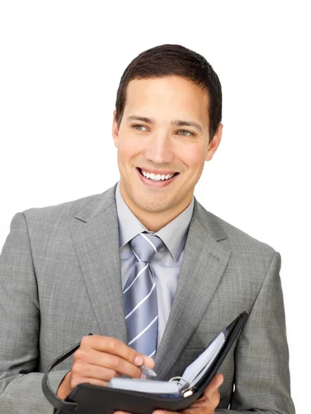 Attractive young businessman holding an agenda — Stock Photo, Image