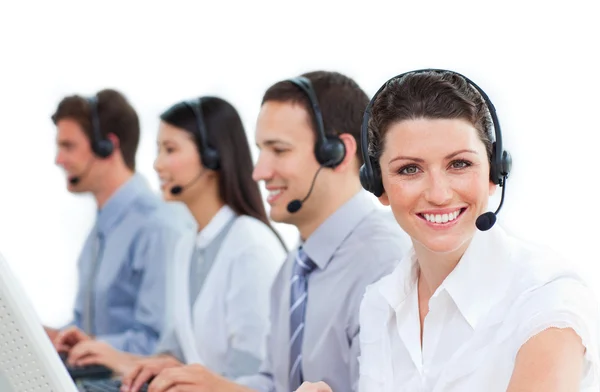 Multi-ethnic business team talking on headset — Stock Photo, Image