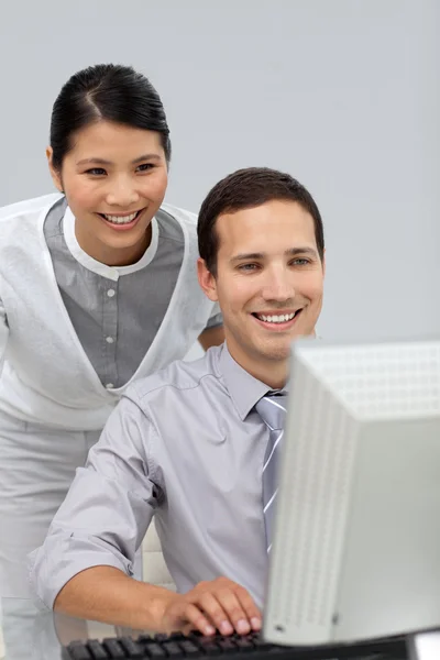 Female manager checking her employee's work — Stock Photo, Image