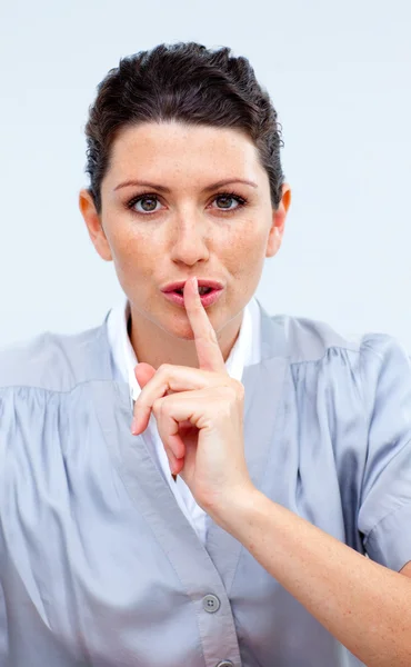 Serious business woman asking for silence — Stock Photo, Image