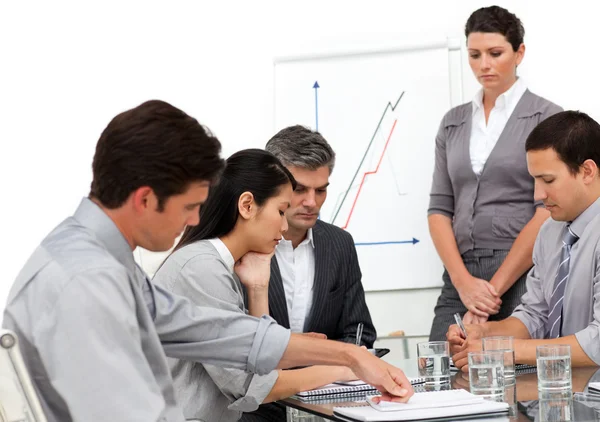 Serious business group at a presentation — Stock Photo, Image