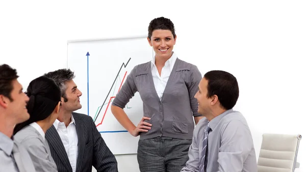 Charming businesswoman giving a presentation — Stock Photo, Image