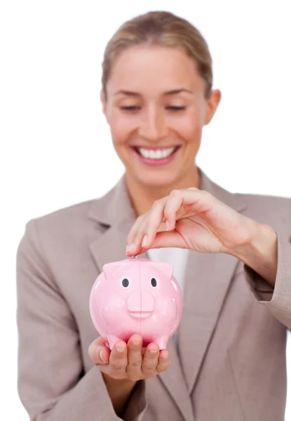 Uśmiechnięta kobieta oszczędności w skarbonka — Zdjęcie stockowe