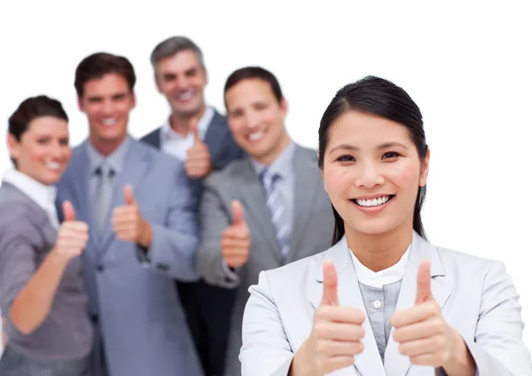 Cheerful business partners with thumbs up — Stock Photo, Image