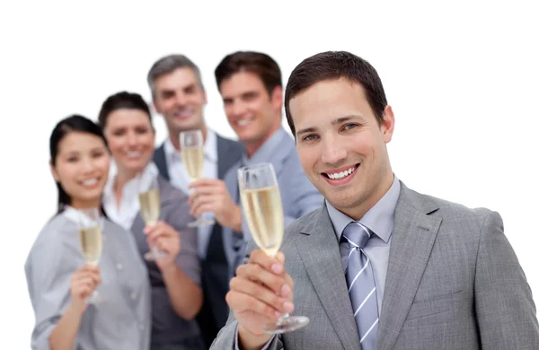 Alegre equipo de negocios brindando con Champagne — Foto de Stock