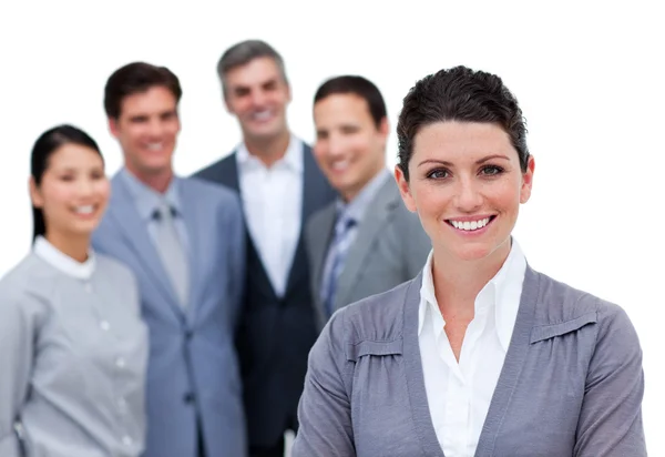 Happy businesswoman with folded arms standing with his team — Stock Photo, Image