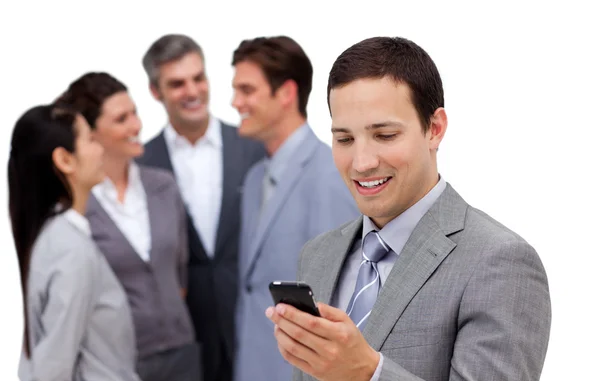 Assertive manager on phone standig in front of his team — Stock Photo, Image