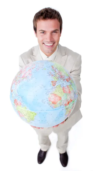 Positiva affärsman visar en terrestrial globe — Stockfoto