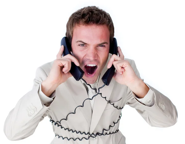 Gestresster Geschäftsmann verheddert sich in Telefondrähten — Stockfoto