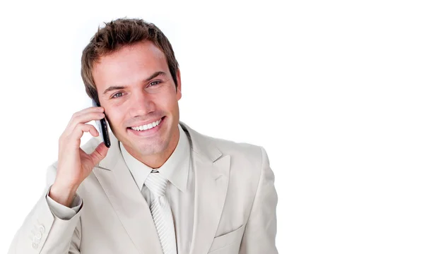 Närbild av en charmig affärsman med en mobiltelefon — Stockfoto