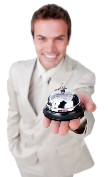 Atractivo hombre de negocios mostrando una campana de servicio — Foto de Stock