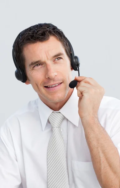 Mature businessman working in a call center — Stock Photo, Image