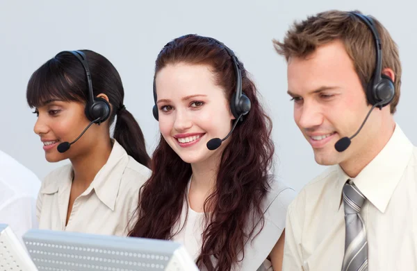 Beautiful woman working with her team in a call center — Stock Photo, Image
