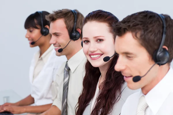Woman working with more in a call center — Stock Photo, Image