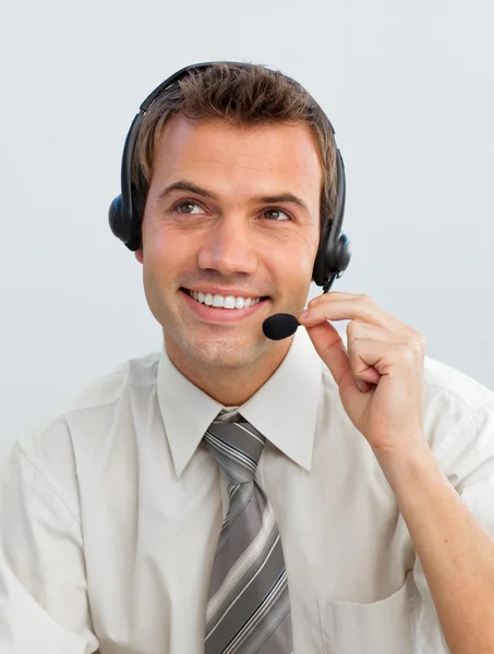 Young businessman working in a call center — Stock Photo, Image