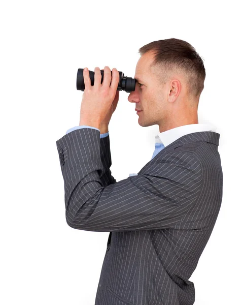 Hombre de negocios serio usando prismáticos —  Fotos de Stock