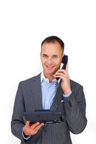 Lachende zakenman met behulp van een telefoon — Stockfoto