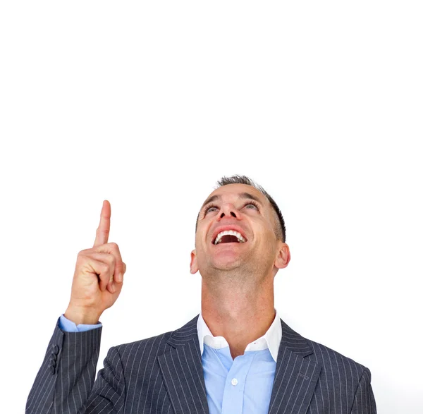 Hombre de negocios alegre apuntando hacia arriba —  Fotos de Stock
