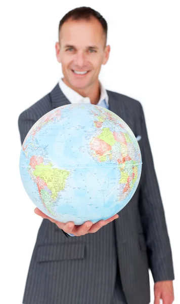 Hombre de negocios alegre sosteniendo un globo terreatrial —  Fotos de Stock