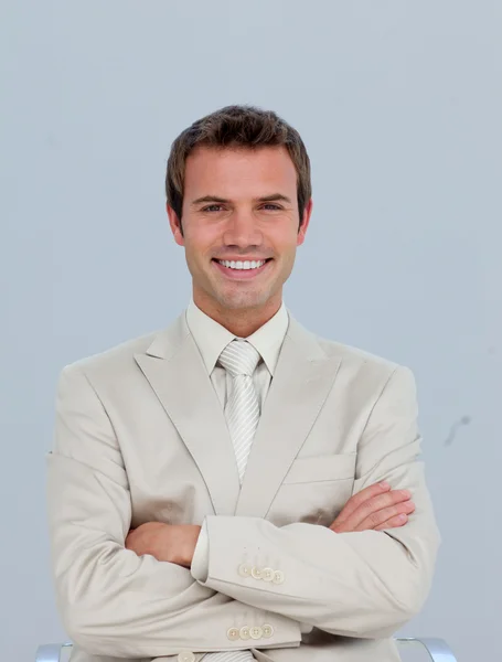 Portrait of smiling businessman with folded arms — Stock Photo, Image