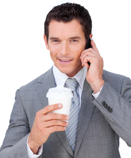 Sebejistí podnikatel na telefonu drží pití z hrnečku — Stock fotografie