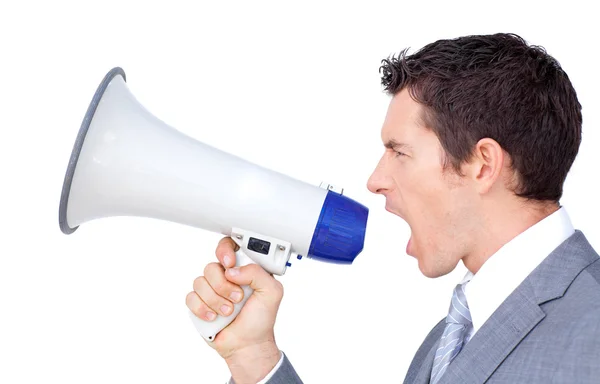Jovem empresário gritando através de um megafone — Fotografia de Stock