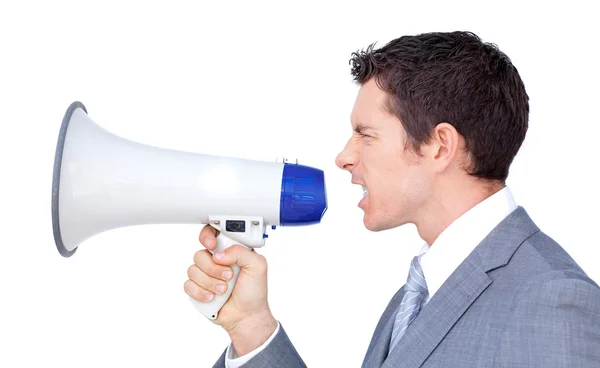 Homem de negócios irritado gritando através de um megafone — Fotografia de Stock
