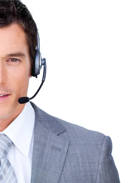 Close-up of a businessman using headset — Stock Photo, Image