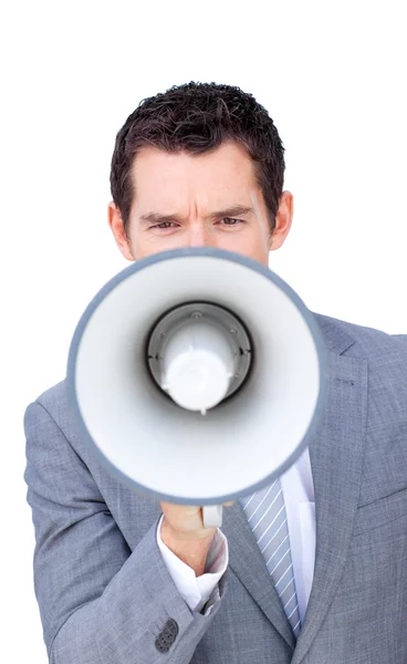 Homem de negócios irritado gritando através de um megafone — Fotografia de Stock