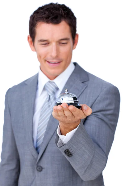 Atractivo hombre de negocios caucásico mostrando una campana de servicio —  Fotos de Stock
