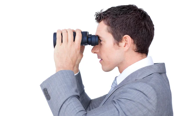 Visionary businessman looking through binoculars — Stock Photo, Image