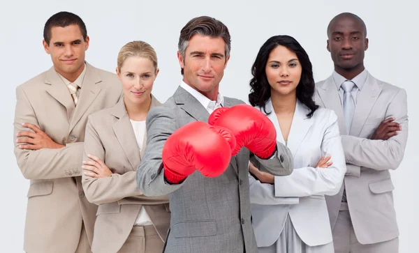 Confident businessman boxing and leading his team — Stock Photo, Image
