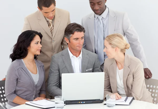Multi-ethnic business team working in office together — Stock Photo, Image