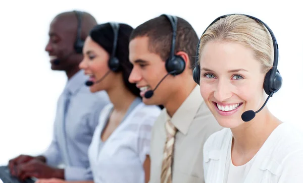 Cheerful business team with headset on — Stock Photo, Image