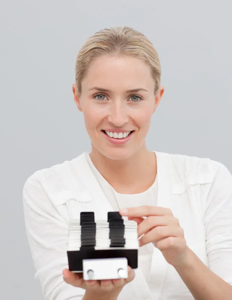 Businesswoman holding an index holder — Stock Photo, Image