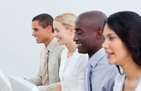 Multi-cultural business team working in the office — Stock Photo, Image