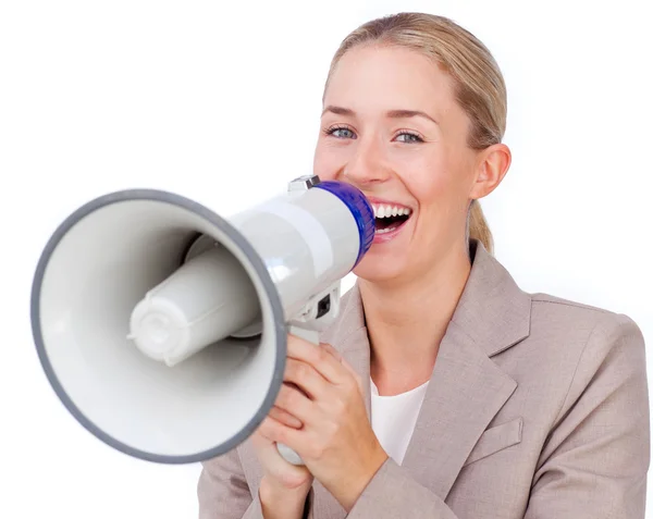 Glad affärskvinna att ge instruktioner med en megafon — Stockfoto