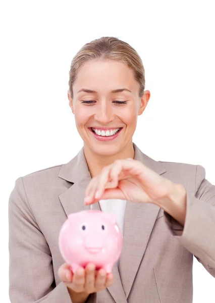 魅力的な女性実業家、piggybank でお金を節約 — ストック写真