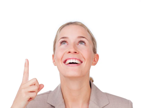 Cheerful businesswoman pointing upward — Stock Photo, Image