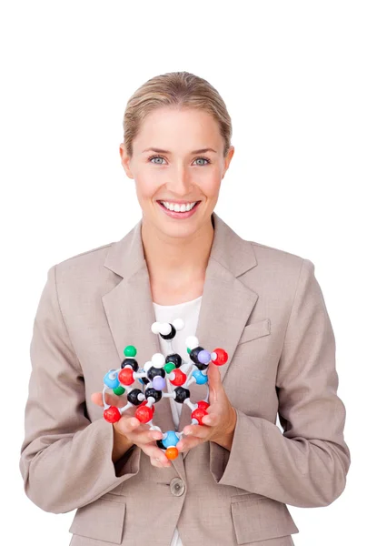 Smiling businesswoman holding a molecule — Stock Photo, Image