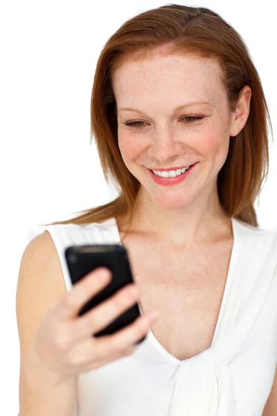 Positiva affärskvinna med en mobiltelefon — Stockfoto