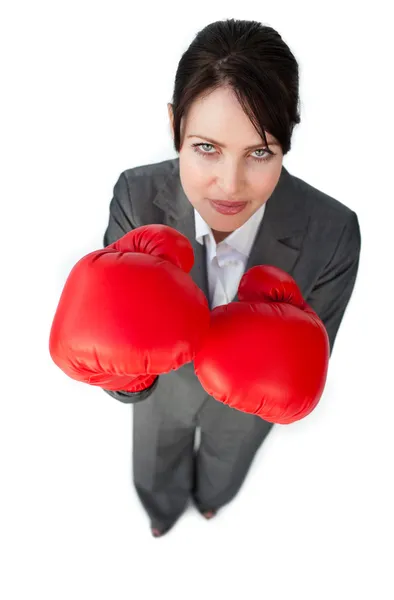 Assertive businesswoman beating the competition — Stock Photo, Image