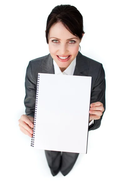Mulher de negócios espumante segurando um caderno — Fotografia de Stock