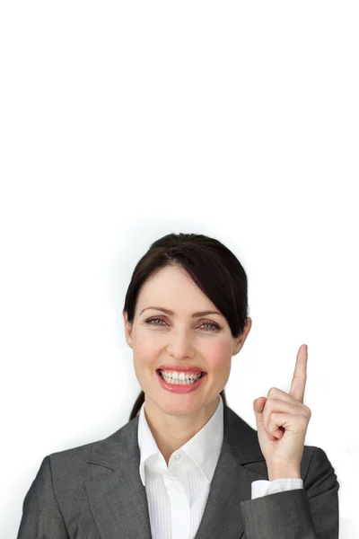 Strålande affärskvinna pekar på en copyspace — Stockfoto